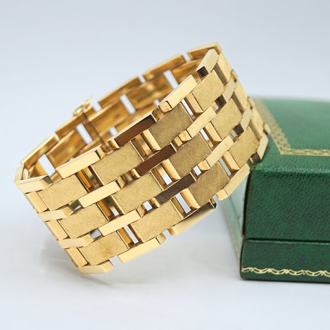 Skrivers; A wide bracelet of 14k gold Skrivers; A wide bracelet of 14k gold